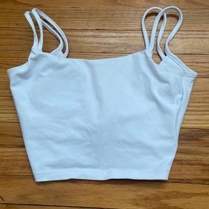 White tank top, backless.